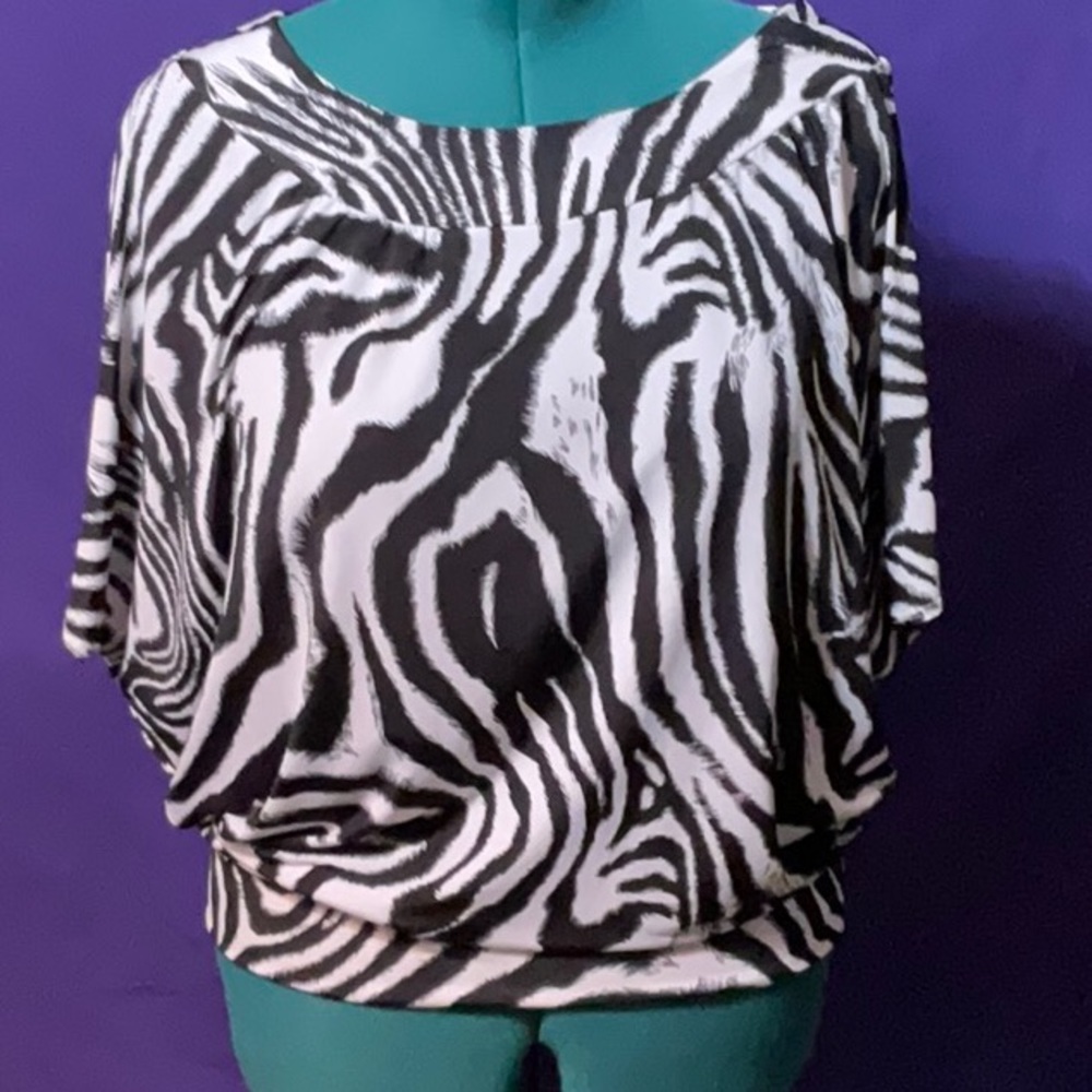 Animal Print women’s sleeveless blouse, size XL